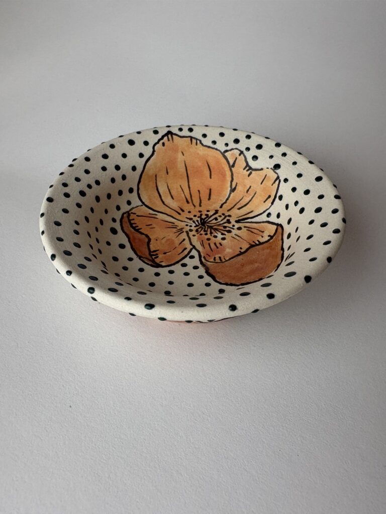 Floral mini featuring a poppy